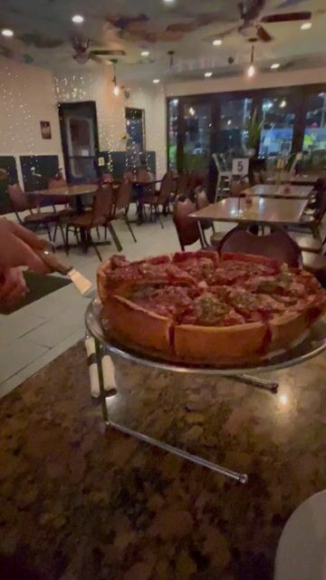 Check out Angelo’s stuffed pizza ! 
Best deep dish in Chicago ,IL

Look at this cheese pull!! 🍕🍕🍕